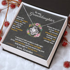 Granddaughter keepsake necklace in silver tone with round heart pendant and flower detail, boxed