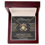 Granddaughter keepsake necklace in gold tone with heart pendant and floral accents, in red gift box